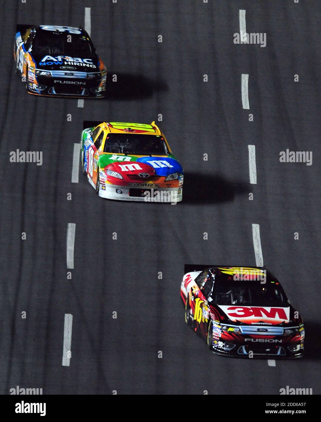 NO FILM, NO VIDEO, NO TV, NO DOCUMENTARY - NASCAR Sprint Cup Series driver Greg Biffle (16) leads Kyle Busch (18) and Carl Edwards (99) to the start/finish line during The Sprint Showdown at Charlotte Motor Speedway in Concord, USA on May 21, 2011. Photo by Jeff Siner/Charlotte Observer/MCT/ABACAPRESS.COM Stock Photo