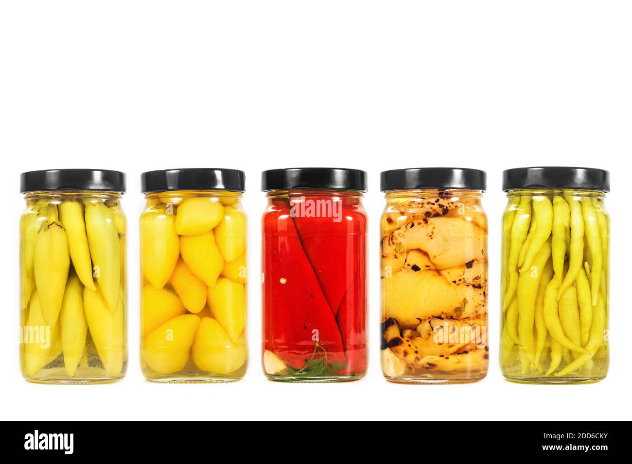 Homemade pickled peppers in jars (traditional Balkan winter food