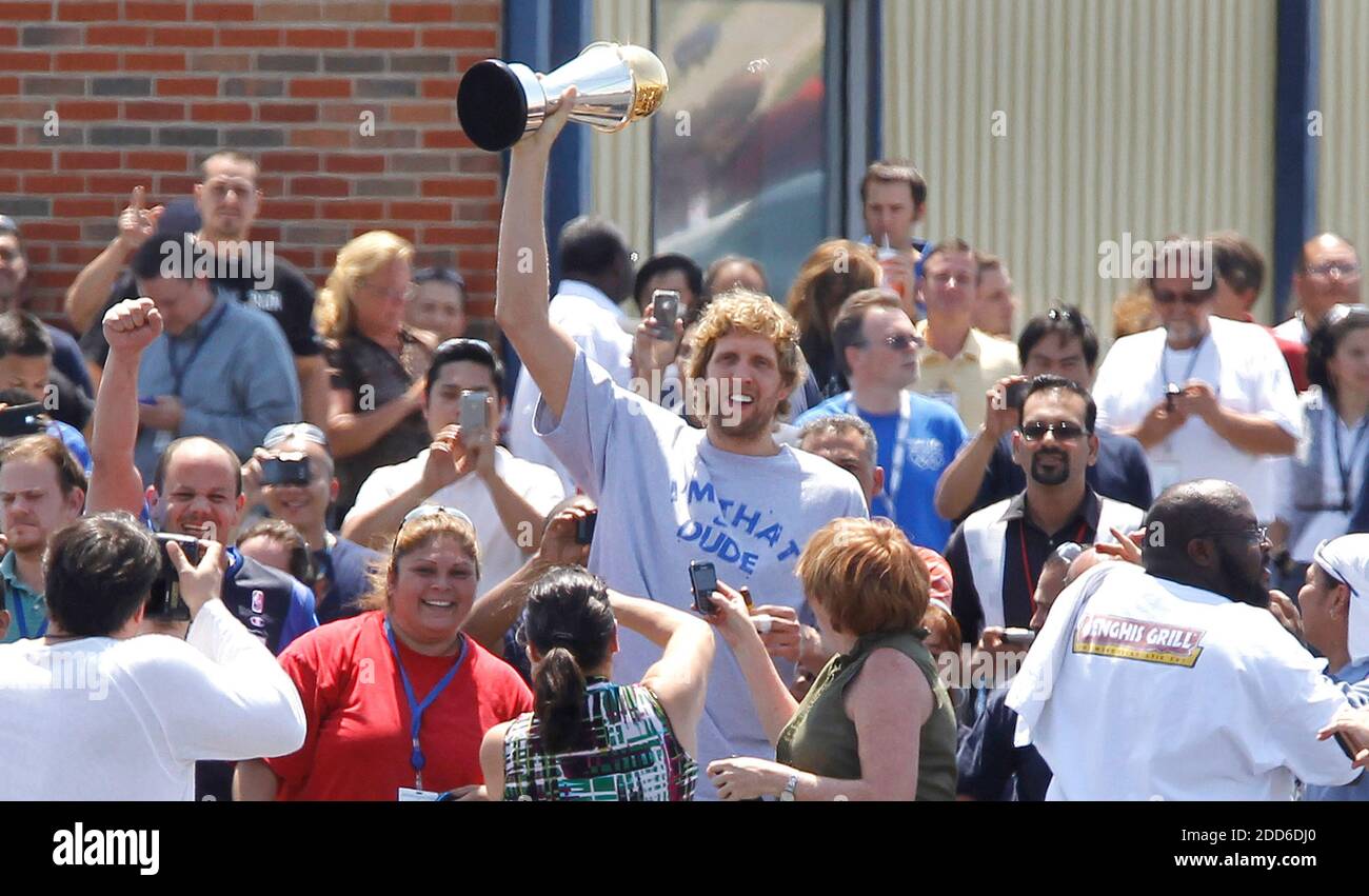 NO FILM, NO VIDEO, NO TV, NO DOCUMENTARY - Dallas Mavericks' Dirk Nowitzki carries the MVP trophy through a crowd after the Mavericks return to Dallas Love Field, TX, USA on June 13, 2011, after defeating the Miami Heat in Game 6 of the NBA Finals on Sunday. (Ron T. Ennis/Fort Worth Star-Telegram/MCT/ABACAPRESS.COM Stock Photo