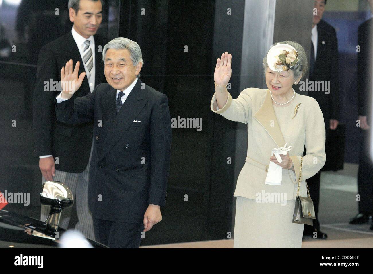 NO FILM, NO VIDEO, NO TV, NO DOCUMENTARY - The Emperor and Empress wave to a crowd celebrating the birth of a new prince while heading for an academic meeting in Sapporo on Wednesday. Princess Kiko, daughter-in-law to Emperor Akihito, gave birth to a 5.64-pound healthy boy on Spetember 6, 2006, the first male child born in the imperial family since 1965. The birth silenced debate over whether Japan should let females ascend to the throne after 125 unbroken generations. Photo by Yomiuri Shimbun/MCT/ABACAPRESS.COM Stock Photo