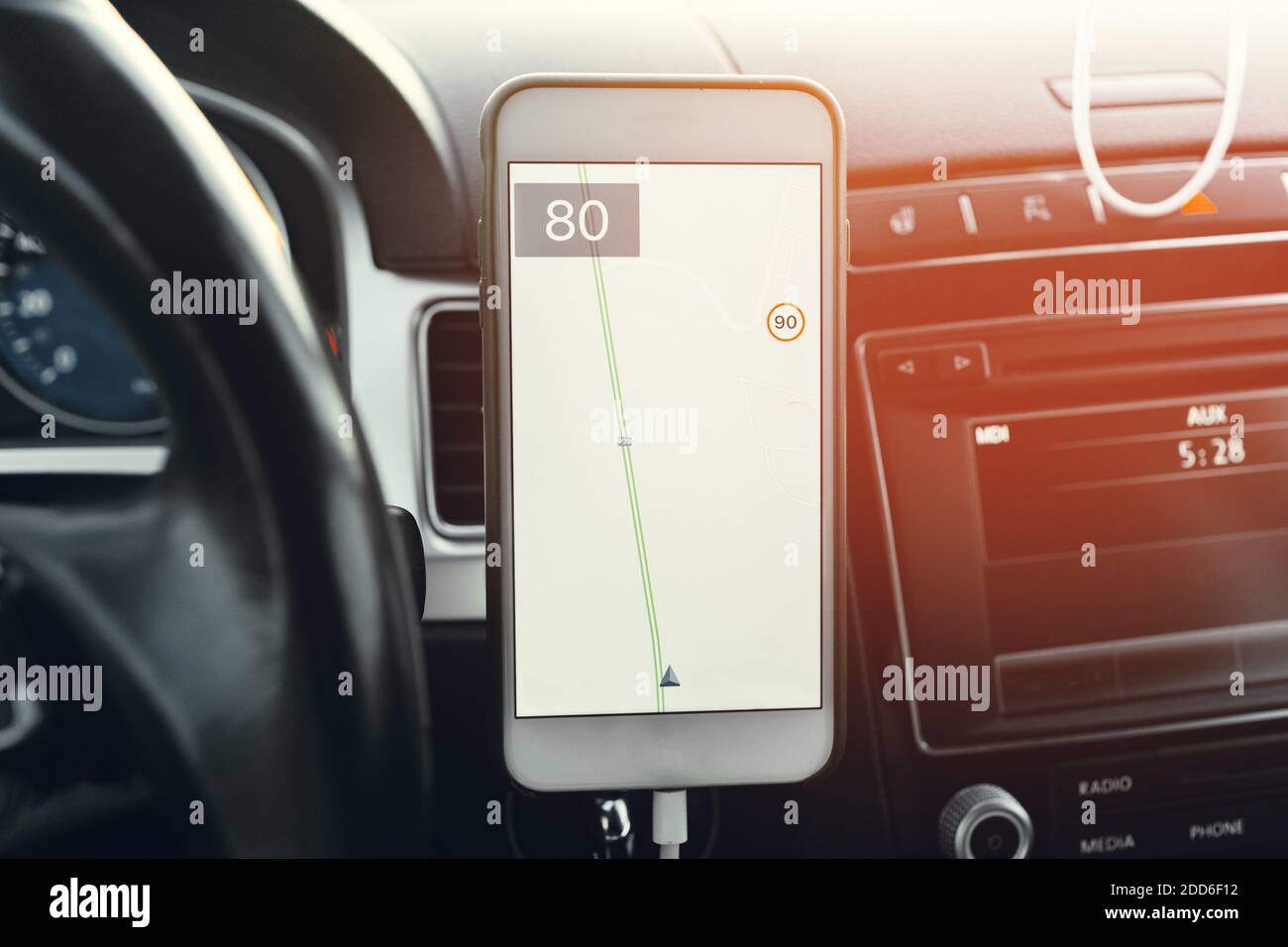 Smartphone with open gps navigation app on torpedo in car Stock Photo -  Alamy