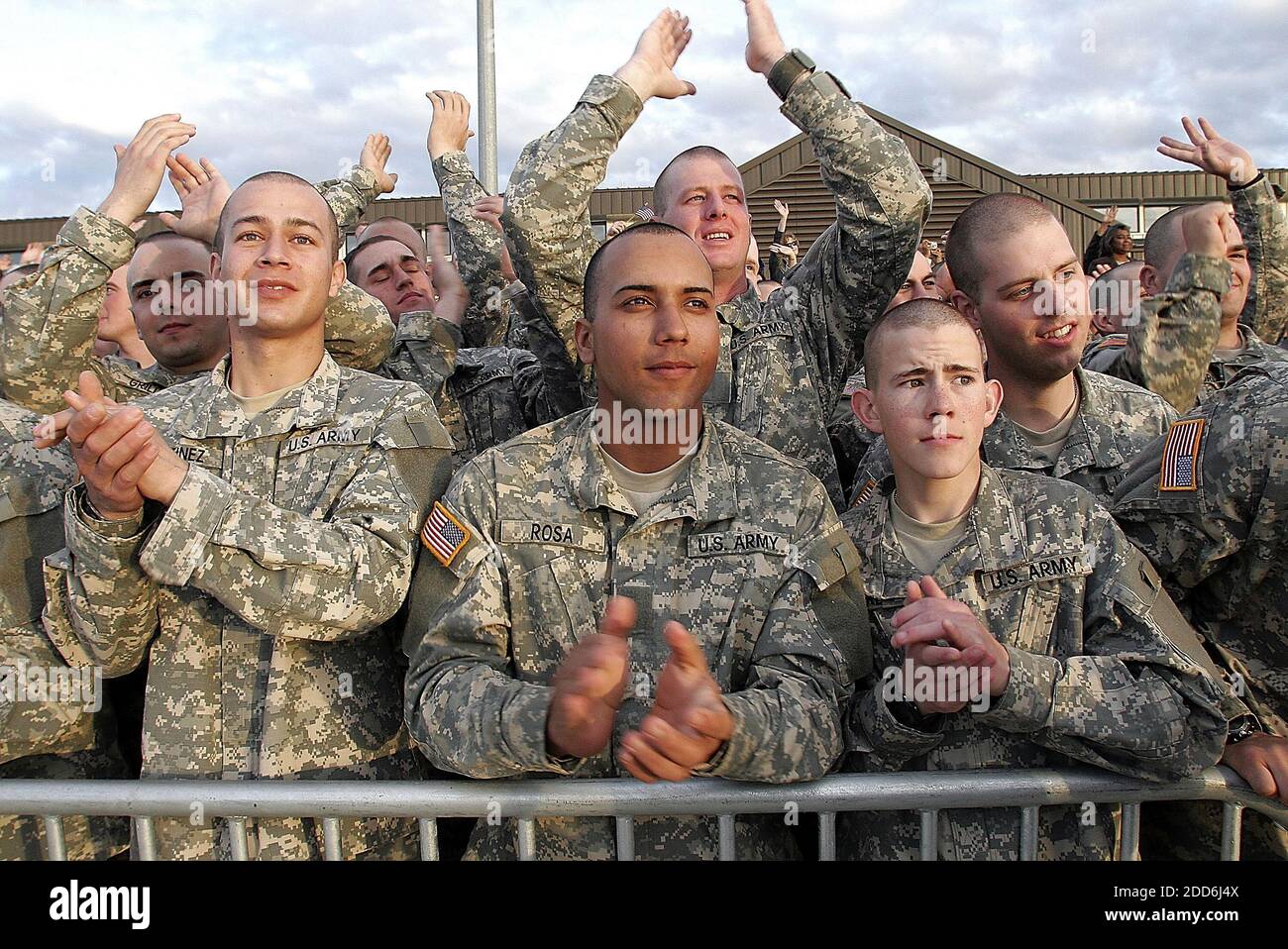 NO FILM, NO VIDEO, NO TV, NO DOCUMENTARY - Fort Benning soldiers applaud as President George W. Bush waives goodbye at Fort Benning, Georgia, Thursday, January 11, 2007. Photo by Mike Haskey/Columbus Ledger-Enquirer/MCT/ABACAPRESS.COM Stock Photo