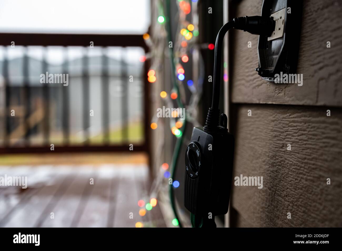 Outdoor setup and installation of Christmas decorations using a timer ...