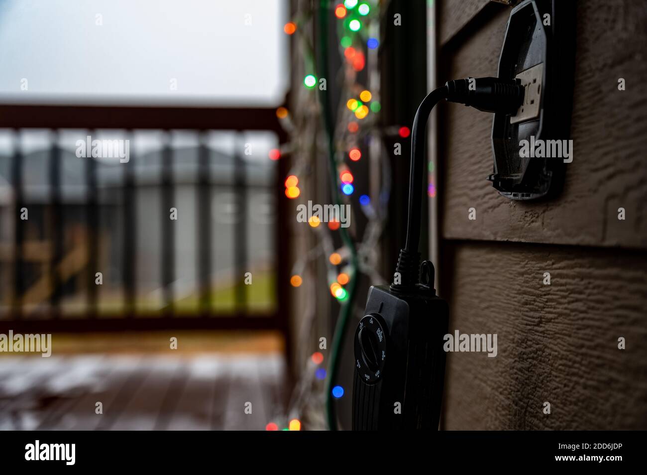 Outdoor setup and installation of Christmas decorations using a timer ...