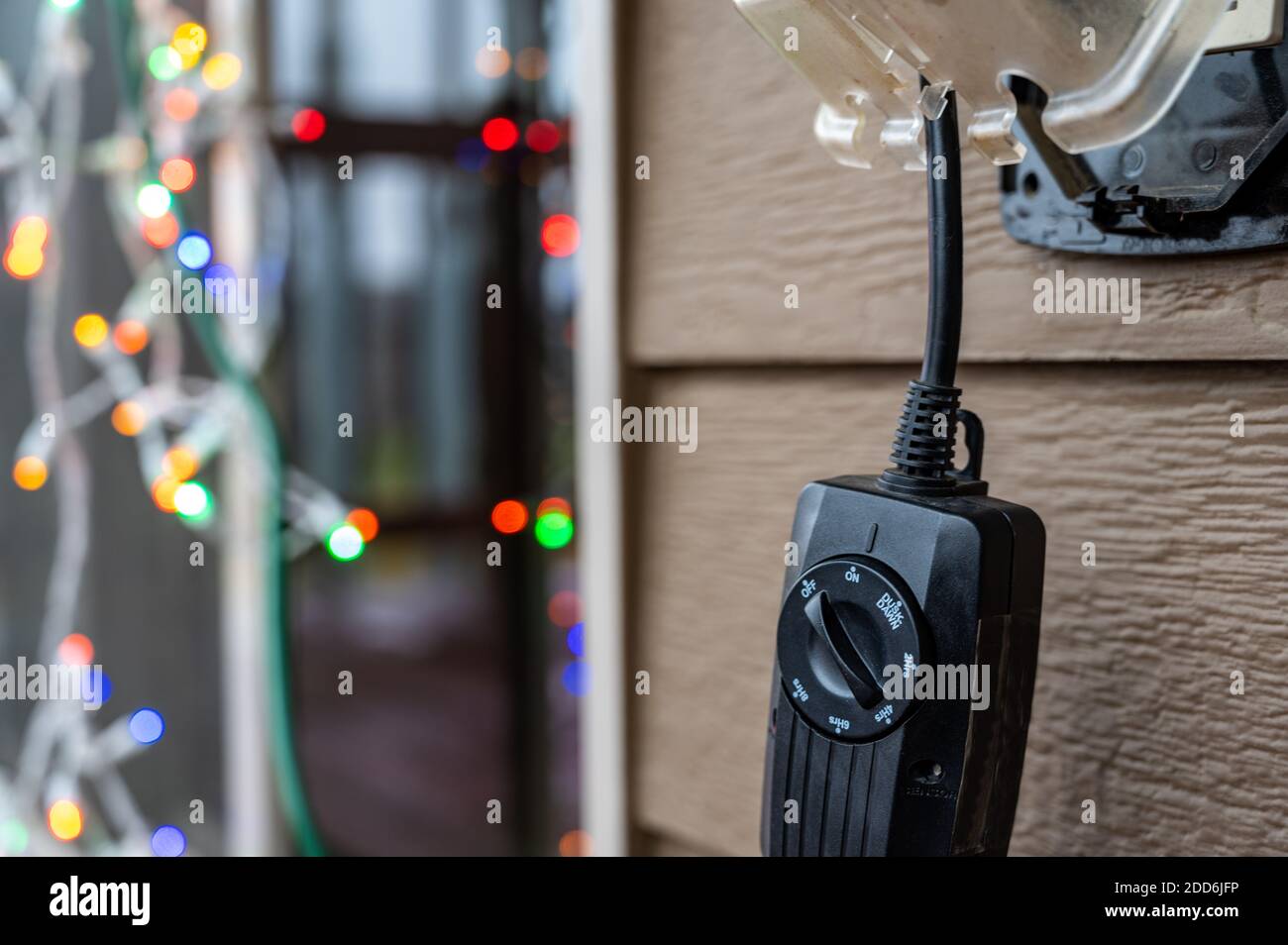 Outdoor setup and installation of Christmas decorations using a timer ...