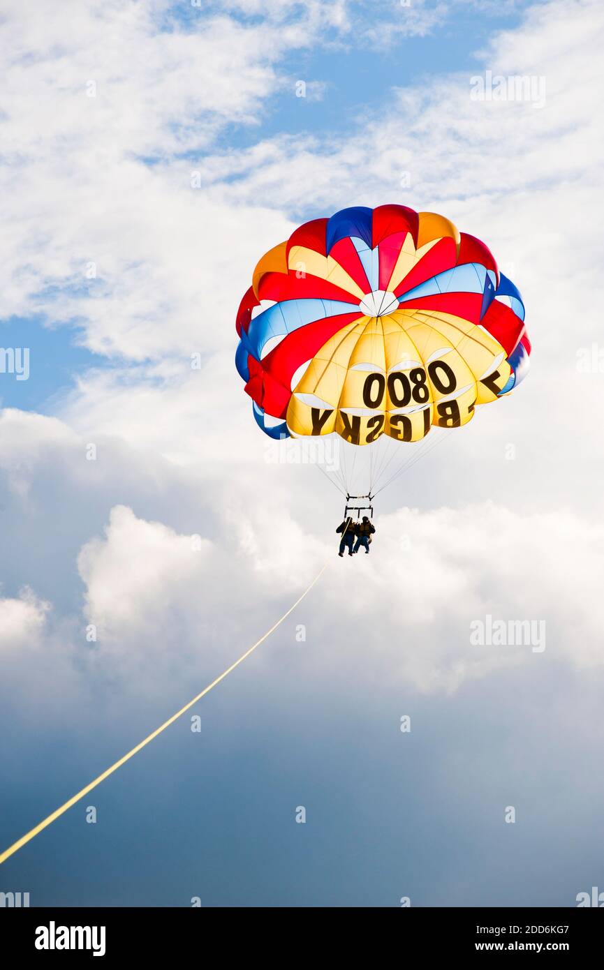 Tourist Couple Parasailing over Lake Taupo, Waikato Region, North Island, New Zealand Stock Photo