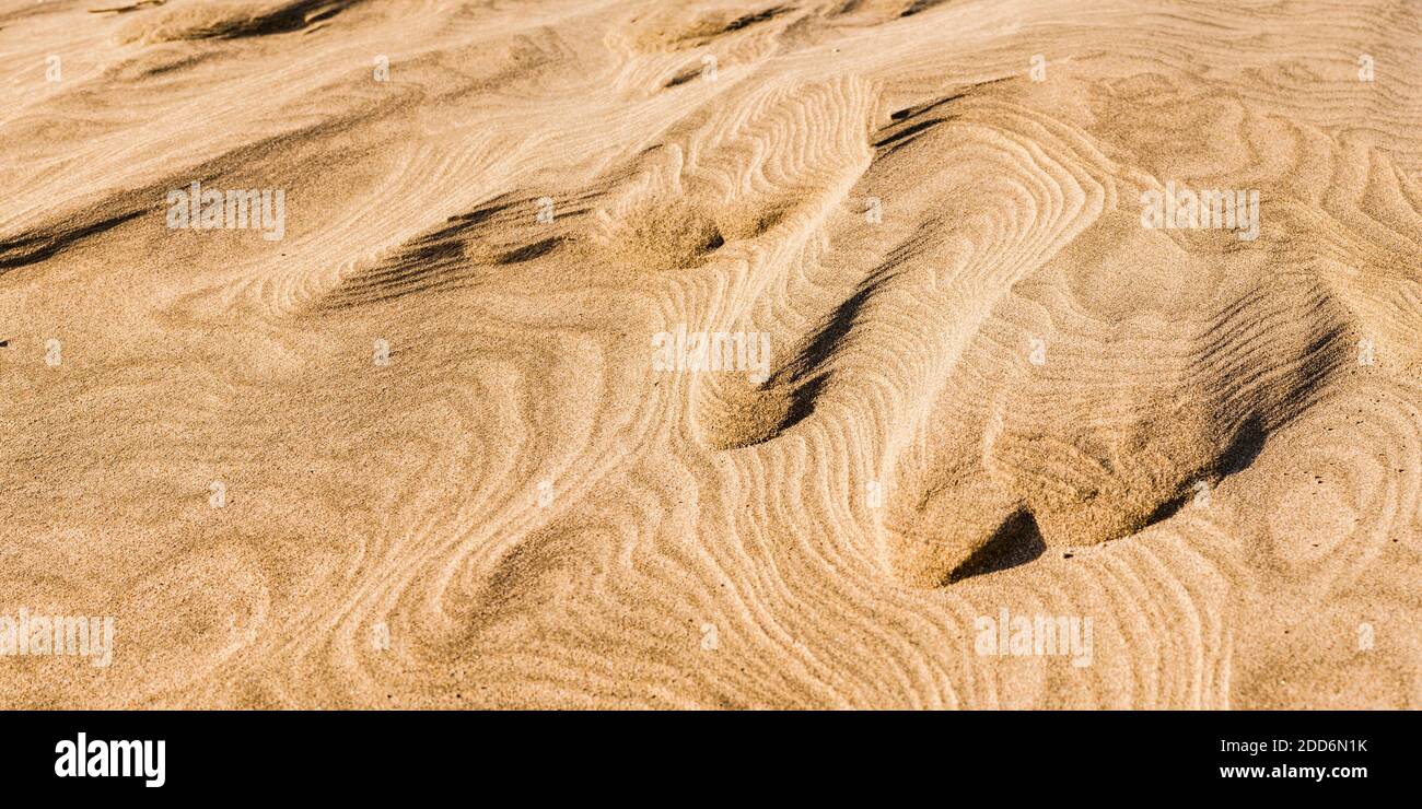 Close Up Panoramic Photo of Sand Patterns at Wharariki Beach, Golden Bay, South Island, New Zealand Stock Photo