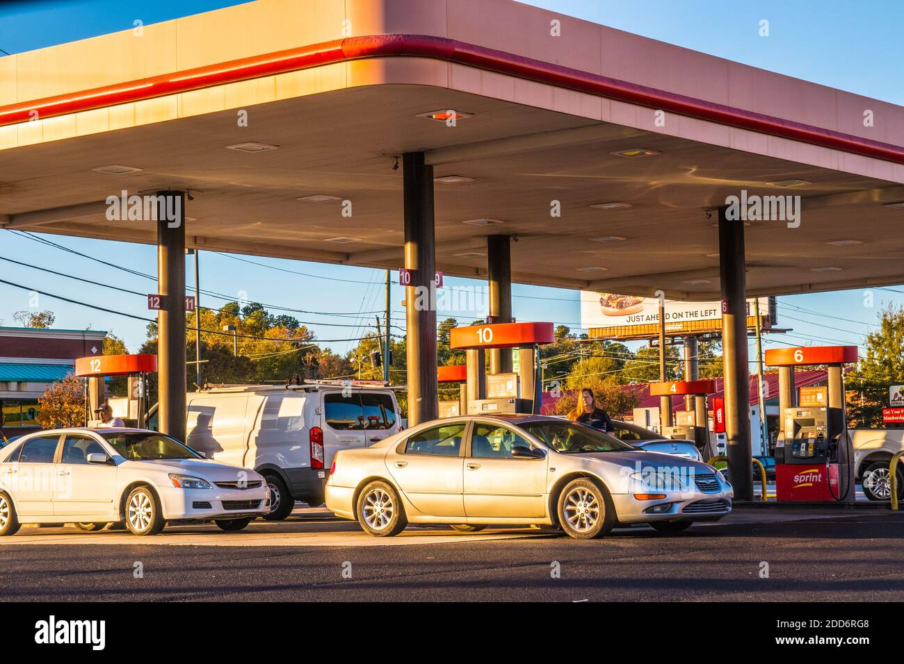 Augusta, Ga / USA 11 20 20 Cars and people pumping gas at the Sprint
