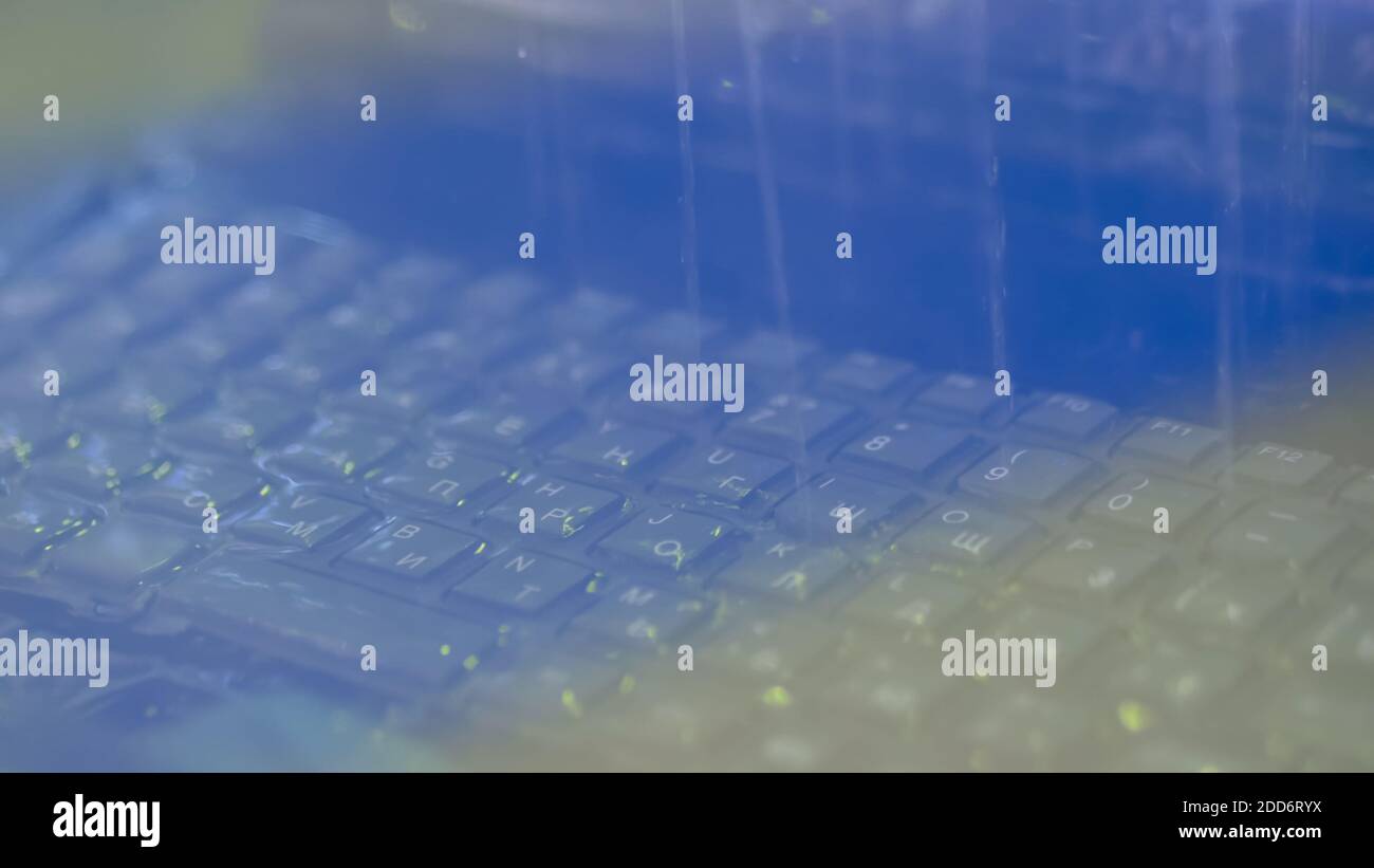 Keyboard of rugged laptop computer during water resistance test close