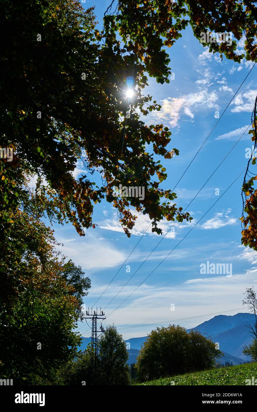 Powerlines crossing the sky Stock Photo