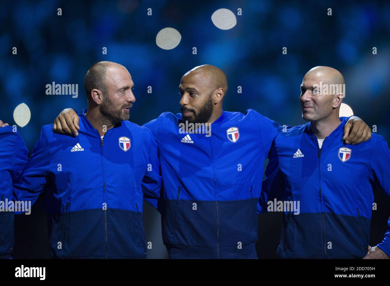 Christophe Dugarry, Thierry Henry, Zinedine Zidane during an exhibition  football match between France's 1998 World Cup's French football national  team and FIFA 98 composed with former international players, to mark the  20th