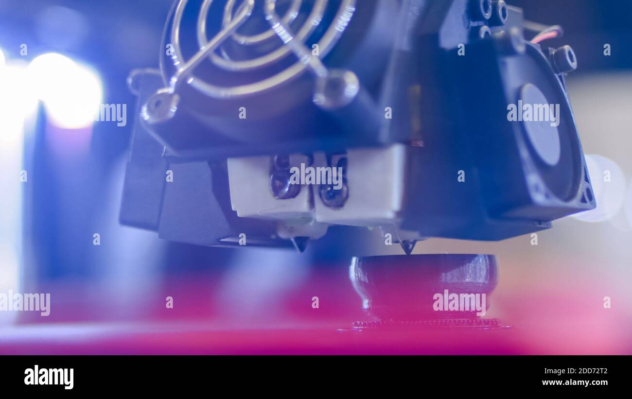 Three dimensional printing machine prints physical 3D model - close up Stock Photo