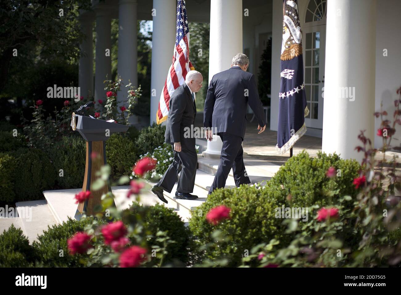 NO FILM, NO VIDEO, NO TV, NO DOCUMENTARY - President George W. Bush walks from the Rose Garden with his nominee for the new U.S. Attorney General, retired New York judge Michael Mukasey (left), in Washington, D.C., USA on September 17, 2007. Mukasey, 66, would replace Alberto Gonzales, who resigned last month after he became embroiled in controversy over the firings of nine federal prosecutors. Photo by Chuck Kennedy/MCT/ABACAPRESS.COM Stock Photo