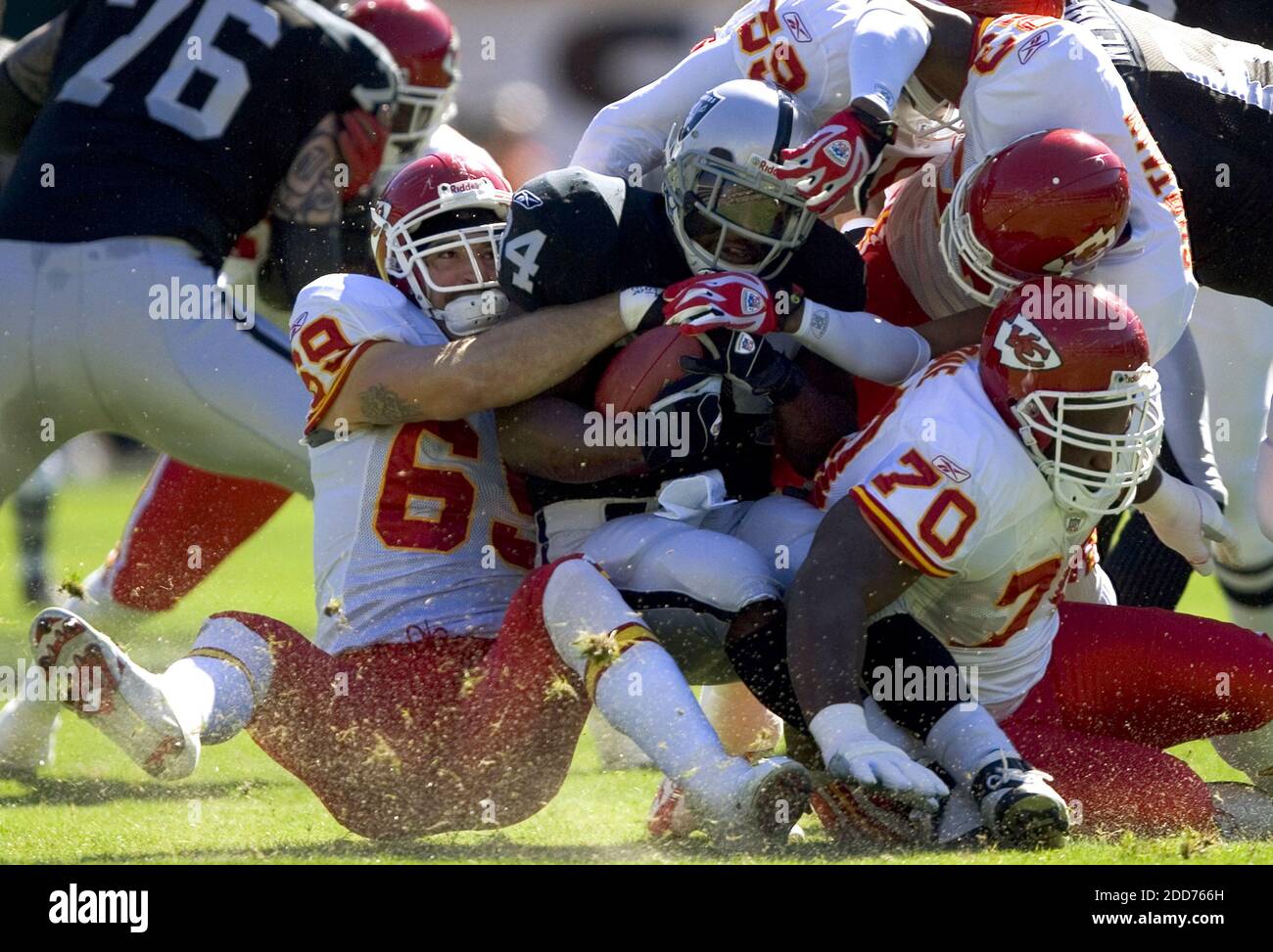 NO FILM, NO VIDEO, NO TV, NO DOCUMENTARY - Oakland Raiders LaMont Jordan is tackled by the Kansas City Chiefs defense for no gain in the first quarter. The Chiefs defeated the Raiders 12-10 at McAfee Coliseum in Oakland, CA, USA on October 21, 2007. Photo by Paul Kitagaki Jr./Sacramento Bee/MCT/Cameleon/ABACAPRESS.COM Stock Photo