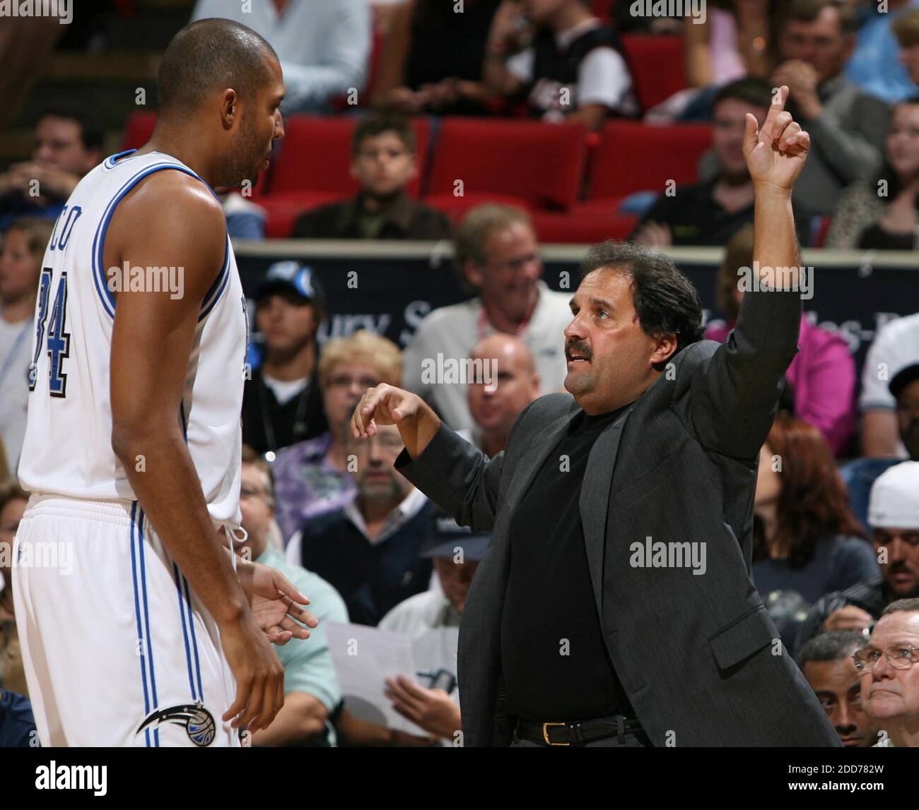 Miami Heat head coach Stan Van Gundy (R) with guard Jason Williams