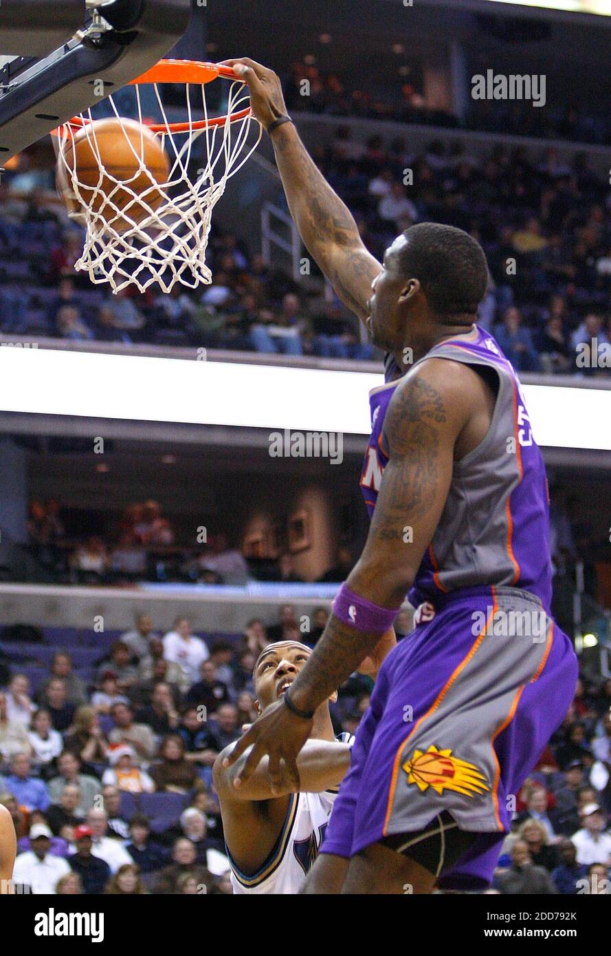 NO FILM, NO VIDEO, NO TV, NO DOCUMENTARY - Phoenix Suns Amare Stoudemire (1) slam dunks over Washington Wizards Caron Butler (3) during their game played at the Verizon Center in Washington, DC, USA on December 7, 2007. Phoenix Suns won 122-107. Photo by Harry E. Walker/MCT/ABACAPRESS.COM Stock Photo