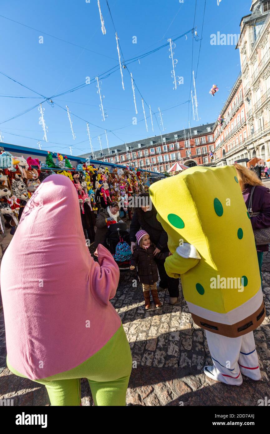 SpongeBob and Patrick Star costumes in Plaza Mayor, Christmas market, Madrid, Spain Stock Photo