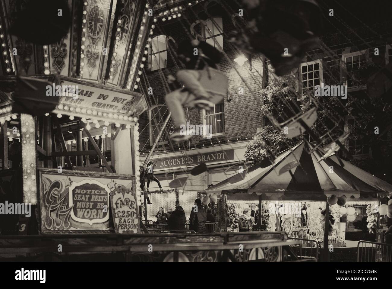 Petworth Fair has been in existance for 800 years by Royal Charter. The Harris family operate the traditional gallopers and chairoplanes dating back 1 Stock Photo
