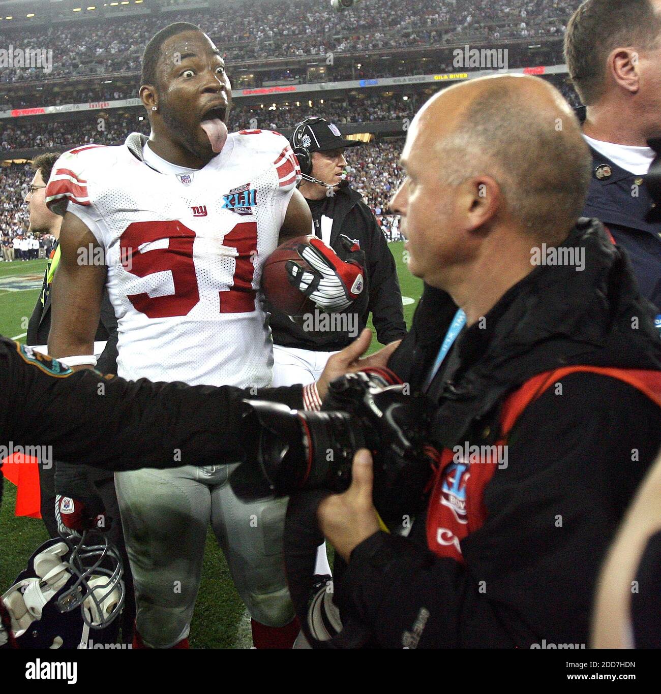 The New York Giants' Justin Tuck (91) celebrates after a 17-14 Giants' victory in Super Bowl XLII at University of Phoenix Stadium in Glendale, AZ, USA on February 3, 2008.  The NY Giants won 17-14. Photo by Gary W. Green/MCT/Cameleon/ABACAPRESS.COM Stock Photo