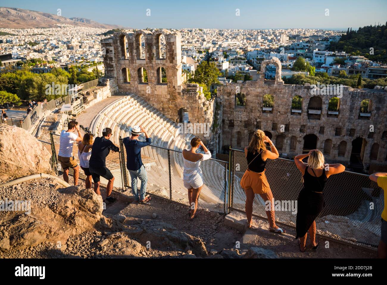 Tourists at Odeon of Herodes Atticus Theatre, by the Acropolis, Athens, Attica Region, Greece Stock Photo