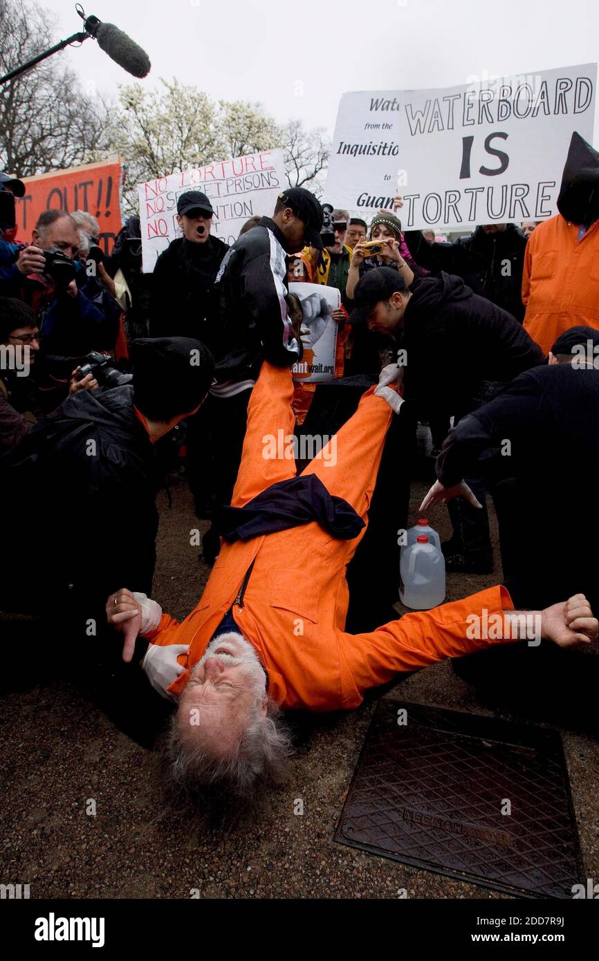 Anti-war protesters demonstrate water boarding during a demonstration near the White House to mark the fifth anniversary of the U.S.-led invasion in Iraq in Washington, D.C., USA on Wednesday, March 19, 2008. Photo by Chuck Kennedy/MCT/ABACAPRESS.COM Stock Photo