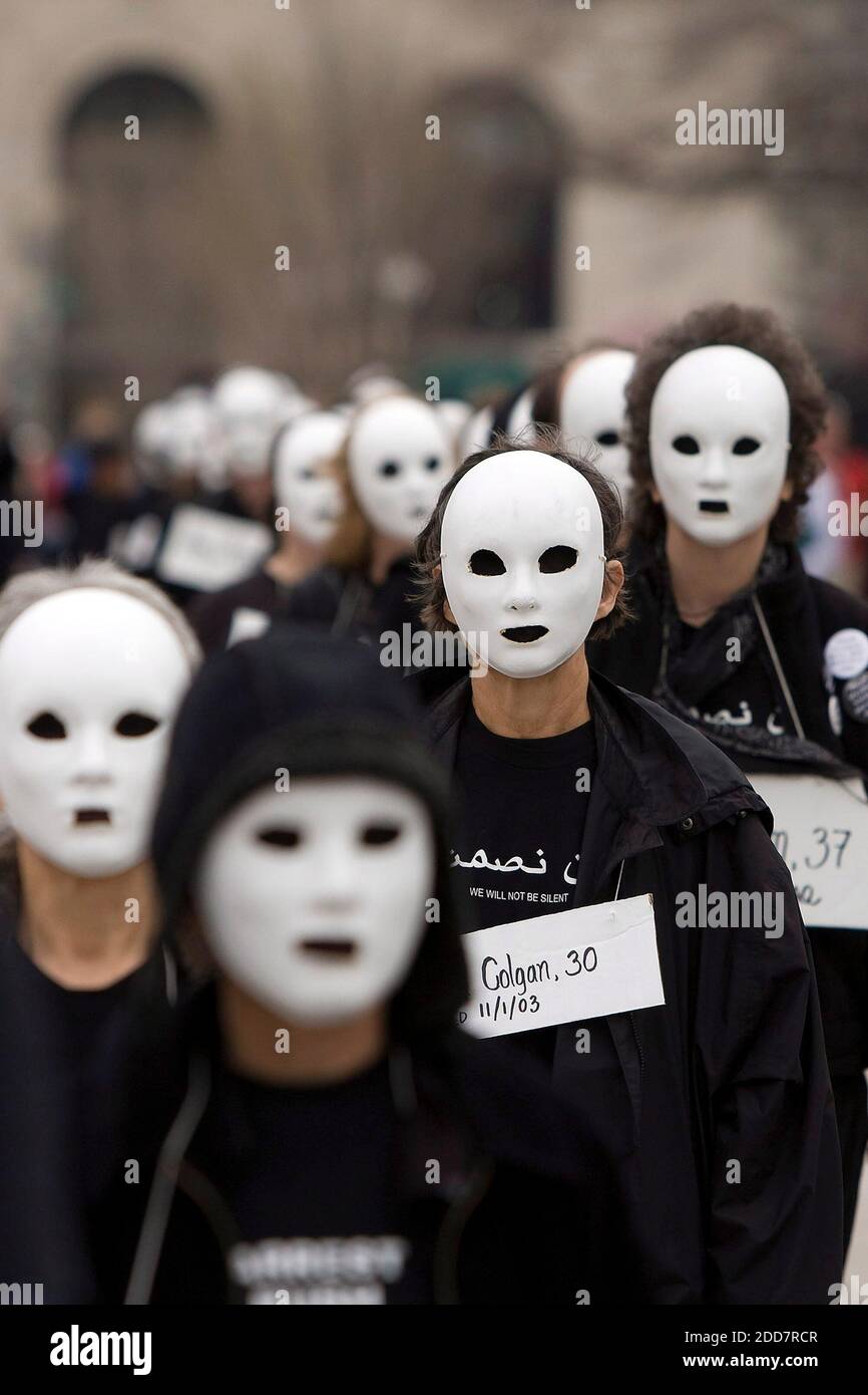 Anti-war protesters wear masks during a demonstration near the White House to mark the fifth anniversary of the U.S.-led invasion in Iraq in Washington, D.C., USA on Wednesday, March 19, 2008. Photo by Chuck Kennedy/MCT/ABACAPRESS.COM Stock Photo