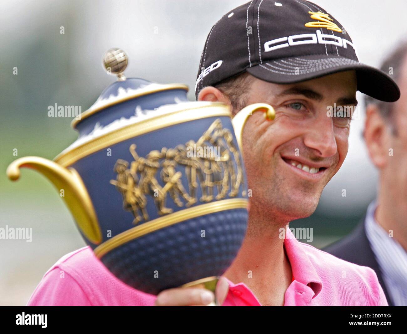 NO FILM, NO VIDEO, NO TV, NO DOCUMENTARY - Geoff Ogilvy hoists the Gene Sarazen Cup after winning the World Golf Championship-CA Championship at the Doral Golf Resort in Miami, FL, USA on March 24, 2008, after rain delayed the finish. Photo by John VanBeekum/Miami Herald/MCT/Cameleon/ABACAPRESS.COM Stock Photo