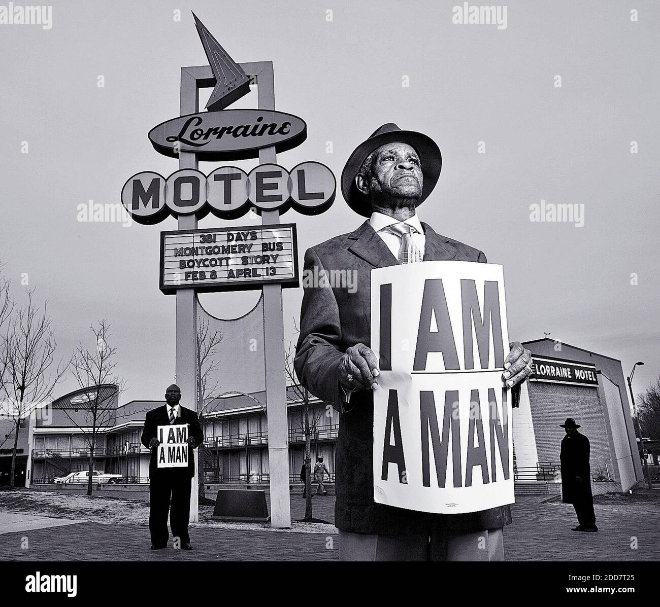 NO FILM, NO VIDEO, NO TV, NO DOCUMENTARY - Standing in front of the former Lorraine Motel, the site of Martin Luther King, Jr. assassination on April 4, 1968, Memphis sanitation workers Elmore Nickelberry, 76, center, and his son, Terrence, left, hold a replica of the placard used by strikers in Memphis, TN, USA, on March 25, 2008. Photo by Carl Juste/Miami Herald/MCT/ABACAPRES.COM Stock Photo