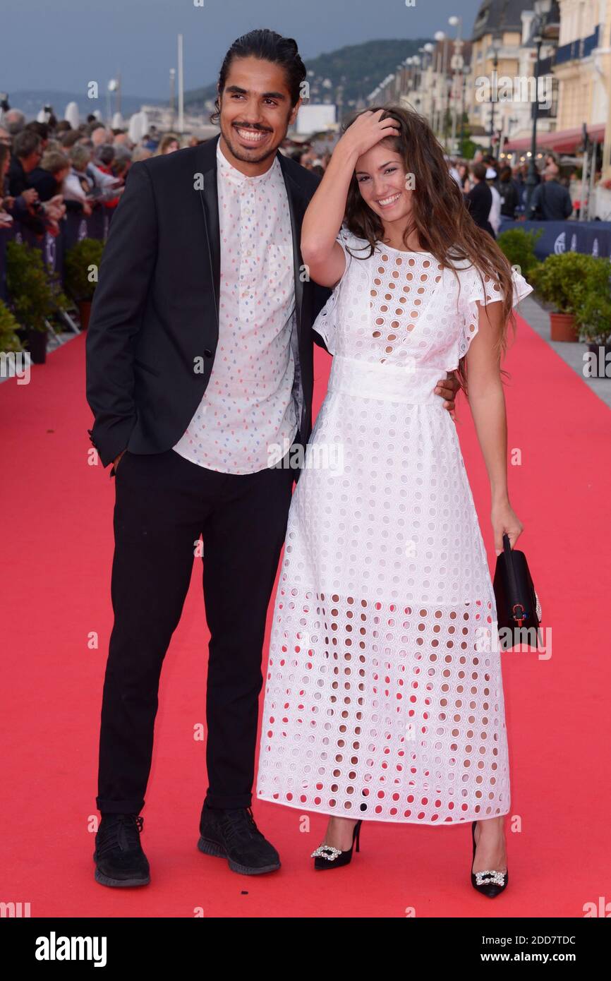 Ophelie Bau and her boyfriend attending the closing red carpet as part