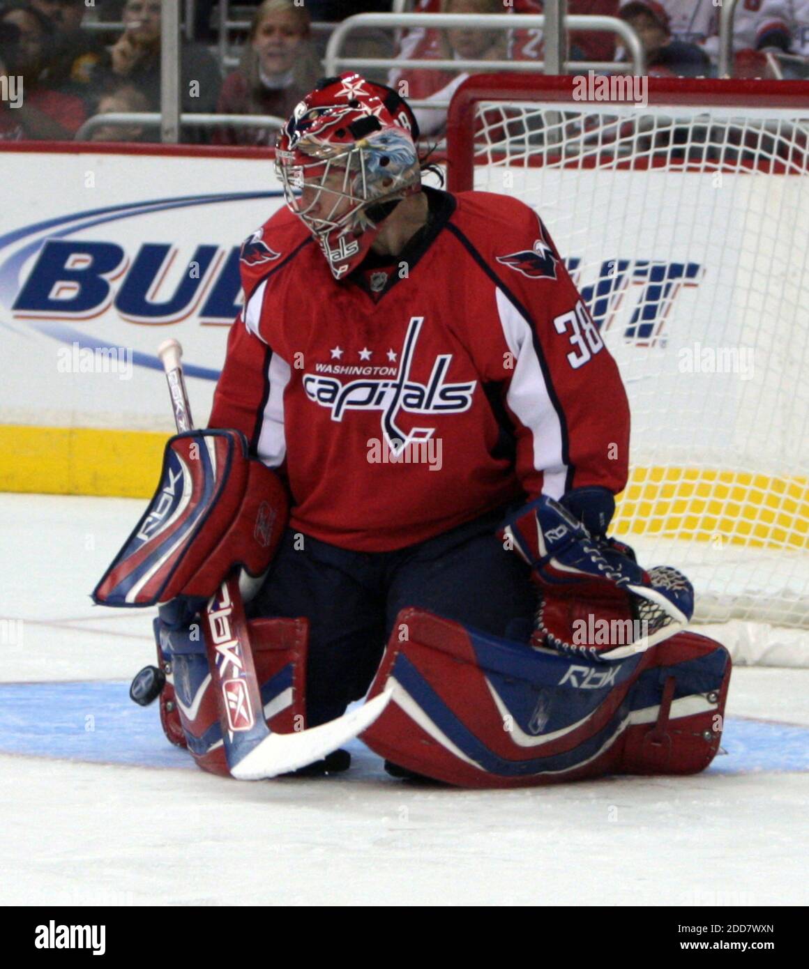 The Washington Capitals' Cristobal Huet stops a shot but gives up a goal on the rebound against the Philadelphia Flyers in the first period of their NHL playoff game at the Verizon Center in Washington, DC, USA on April 13, 2008. Photo by George Bridges/MCT/Cameleon/ABACAPRESS.COM Stock Photo