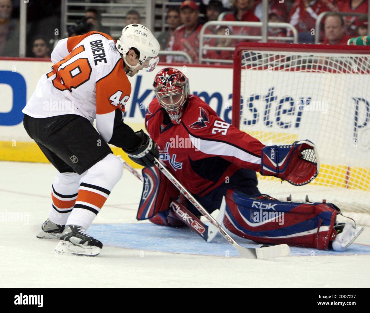 Washington Capitals' goalie Cristobal Huet (38) makes a save on a shot by the Philadelphia Flyers' Daniel Briere (48) in the first period of the Capitals' 3-2 victory in the Stanley Cup playoff game at the Verizon Center in Washington, DC, USA on April 19, 2008 . Photo by George Bridges/MCT/Cameleon/ABACAPRESS.COM Stock Photo