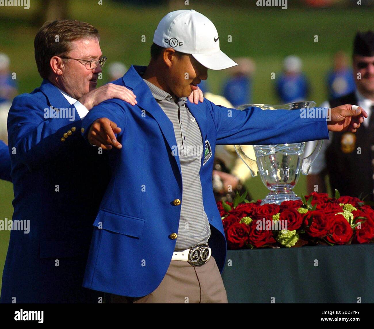 NO FILM, NO VIDEO, NO TV, NO DOCUMENTARY - Ken Thompson, CEO of Wachovia, (left) helps Anthony Kim put on his champion's jacket, after Kim won the Wachovia Championship at Quail Hollow Club in Charlotte, NC, USA on May 4, 2008. Kim won the tournament, finishing at -16 under for the tournament. Photo by Layne Bailey/Charlotte Observer/MCT/ABACAPRESS.COM Stock Photo