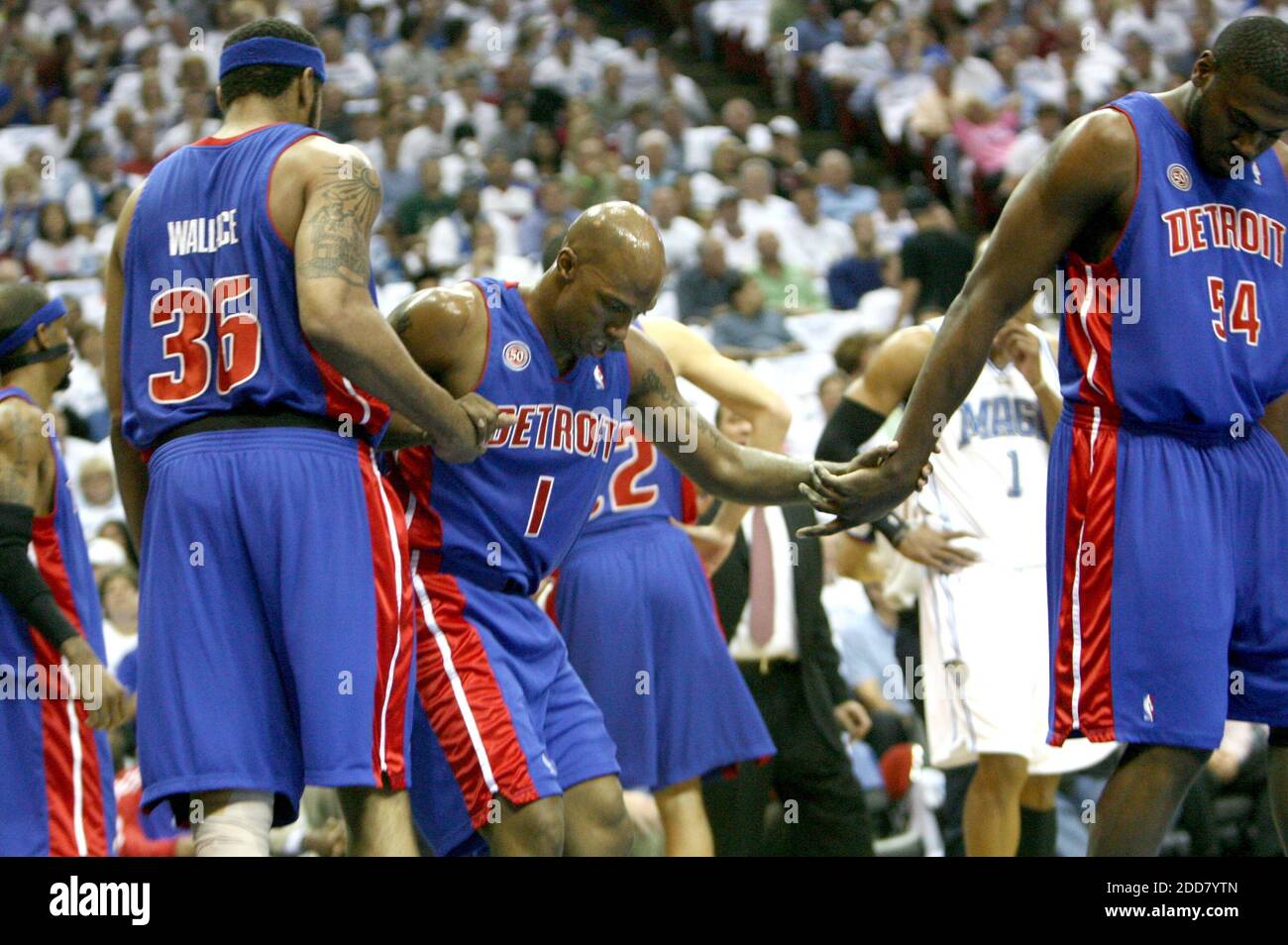 Detroit Piston's Chauncey Billups is helped up by Rasheed Wallace and Jason Maxiell during the first half in Game 3 of the NBA Eastern Conference semifinals against the Orlando Magic at the Amway Arena in Orlando, FL, USA on May 7, 2008. Photo by Gary W. Green/Orlando Sentinel/MCT/Cameleon/ABACAPRESS.COM Stock Photo