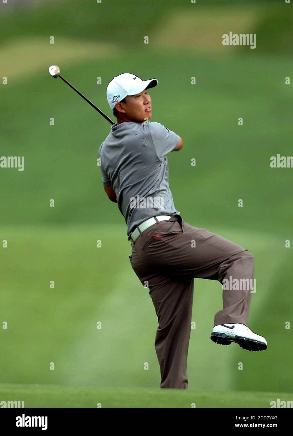 NO FILM, NO VIDEO, NO TV, NO DOCUMENTARY - Anthony Kim kicks his leg up after hitting a shot off the 15th fairway during the final round of the Wachovia Championship at Quail Hollow Club in Charlotte, NC, USA on May 4, 2008. Kim won the tournament, finishing at -16 under for the tournament. Photo by Layne Bailey/Charlotte Observer/MCT/ABACAPRESS.COM Stock Photo