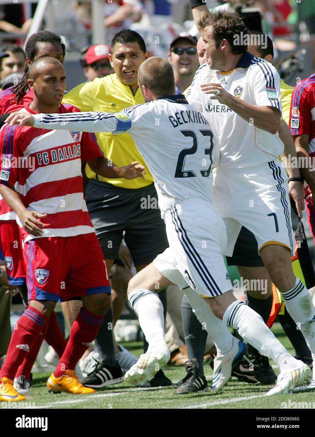 NO FILM, NO VIDEO, NO TV, NO DOCUMENTARY - Los Angeles Galaxy's David Beckham (23) goes after FC Dallas Adrian Serioux, far right, after a serious foul play, as Arturo Alvarez (center) tries to stay between the two and draws a pushing hold card in the final half at Pizza Hut Park in Frisco, TX, USA on May 18, 2008. Photo by Jeffery Washington/Fort Worth Star-Telegram/MCT/Cameleon/ABACAPRESS.COM Stock Photo