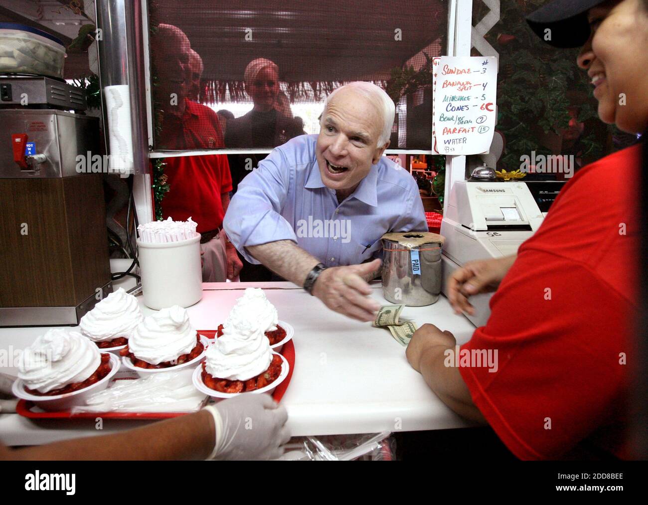 NO FILM, NO VIDEO, NO TV, NO DOCUMENTARY - GOP presidential candidate Arizona Senator John McCain leans through a window at the order counter at Parkesdale Farm Market roadside stand, for some strawberry shortcake, in Plant City, Florida, USA on Thursday, October 23, 2008, during his bus tour across Central Florida. Photo by Joe Burbank/Orlando Sentinel/MCT/ABACAPRESS.COM Stock Photo