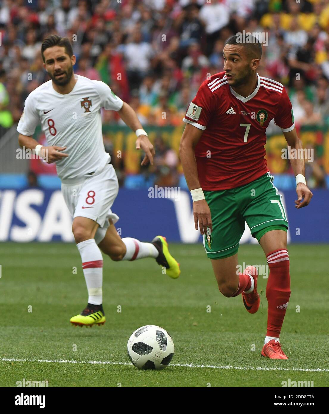 Hakim Ziyach (MOR) and Joao Moutinho (POR) during the 2018 FIFA World Cup Russia group B match between Portugal and Morocco at Luzhniki Stadium on June 20, 2018 in Moscow, Russia. Photo by Christian Liewig/ABACAPRESS.COM Stock Photo