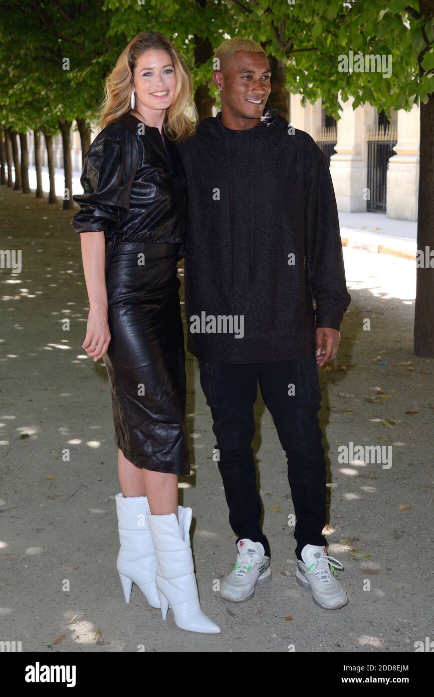 Doutzen Kroes and her husband Sunnery James attending the Louis Vuitton