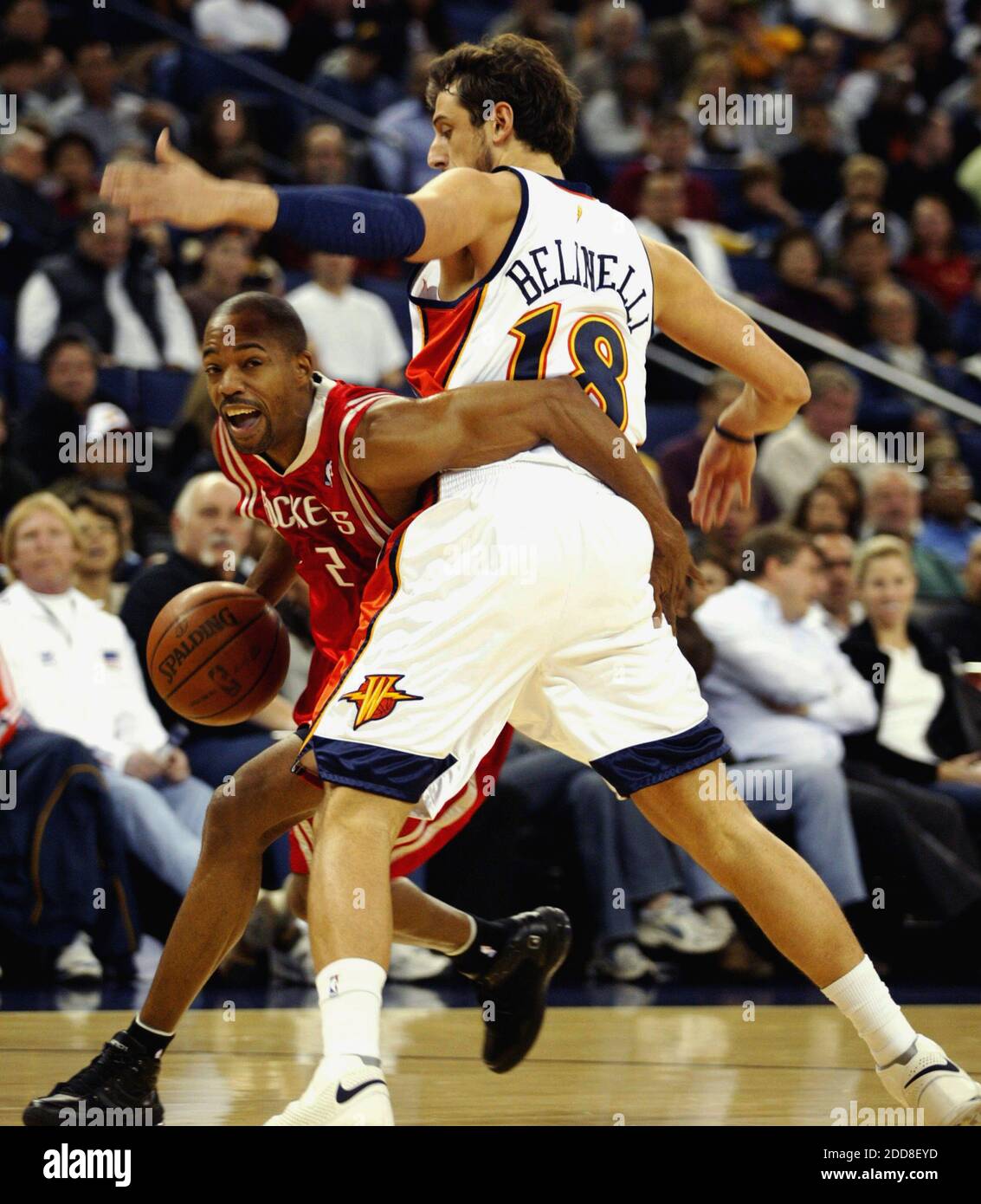 NO FILM, NO VIDEO, NO TV, NO DOCUMENTARY - The Houston Rockets' Rafer Alston (left) drives the ball against the Golden State Warriors' Marco Belinelli (18) in the first quarter at Oracle Arena in Oakland, CA, USA on December 12, 2008. Photo by Anda Chu/Oakland Tribune/MCT/Cameleon/ABACAPRESS.COM Stock Photo