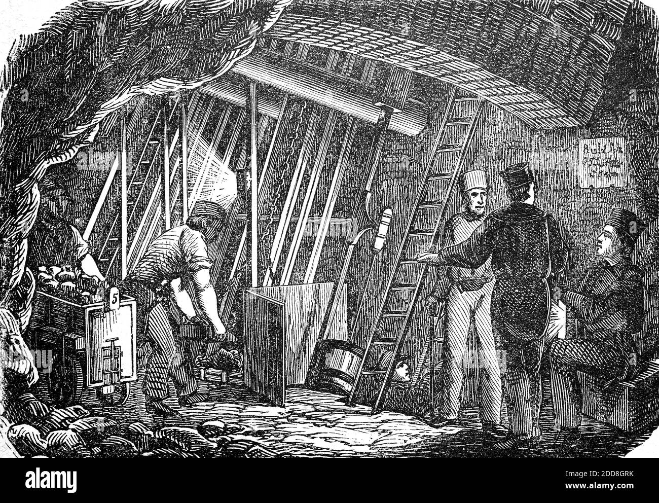 Mining, Mine, Filling the ore into a lorry, England, 1880  /  Bergbau, Mine, Einfüllen des Erz in eine Lore, England, 1880, Historisch, historical, digital improved reproduction of an original from the 19th century / digitale Reproduktion einer Originalvorlage aus dem 19. Jahrhundert, Stock Photo
