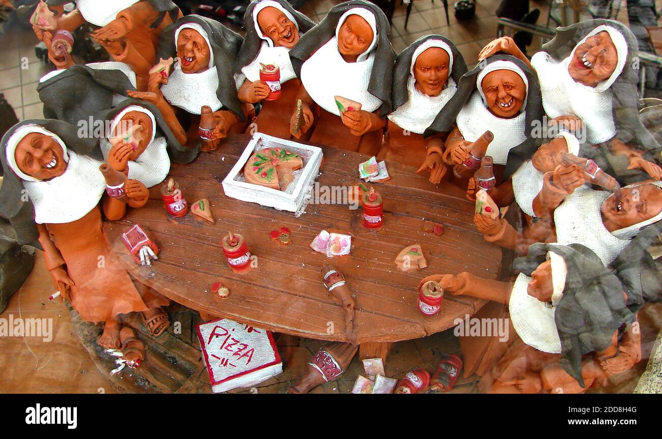Madeira 2007 - Irreverent miniature hand made sculpture depicting nuns celebrating a birthday.jpg - Stock Photo