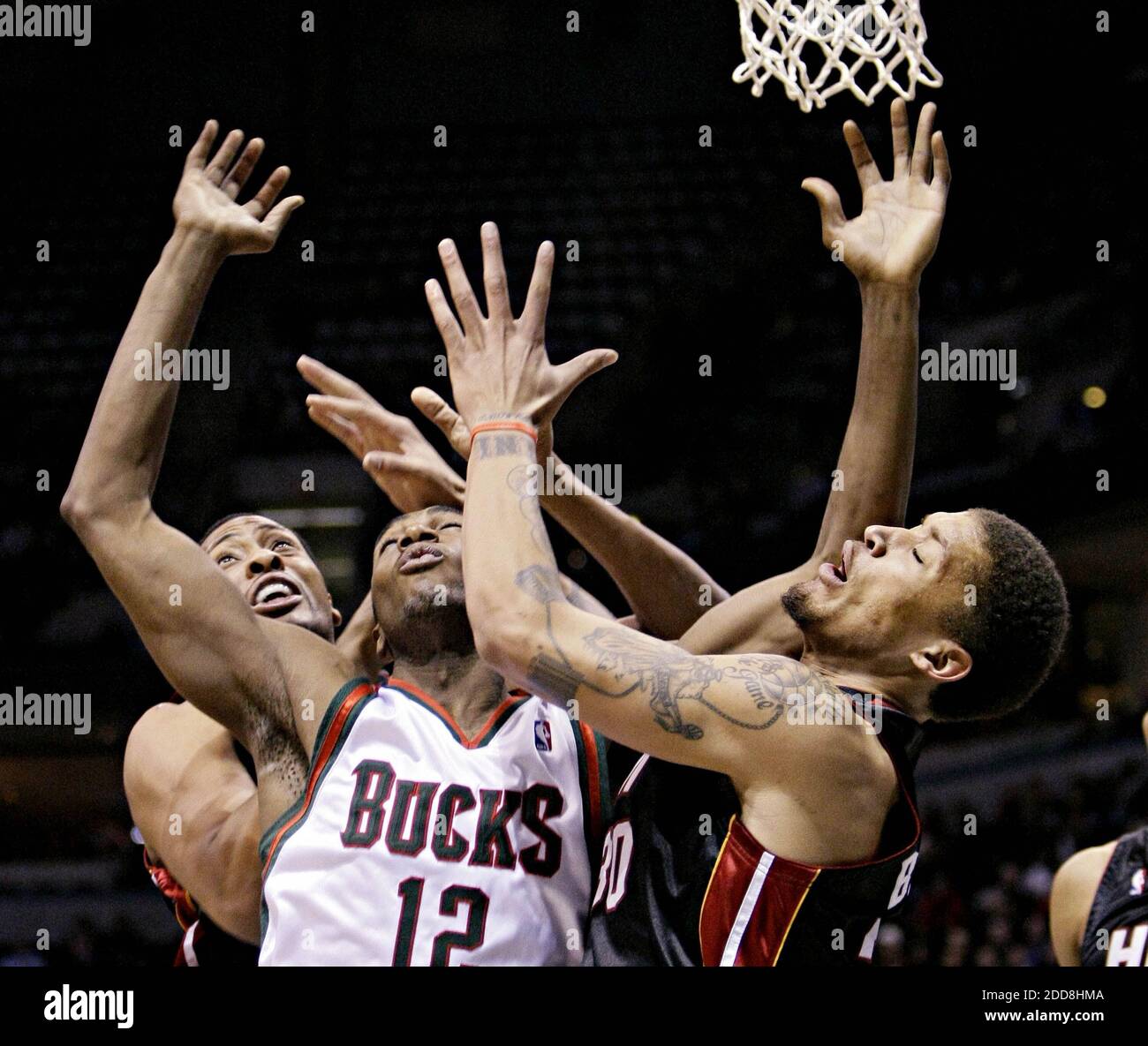Milwaukee Bucks Michael Beasley left drives to the basket