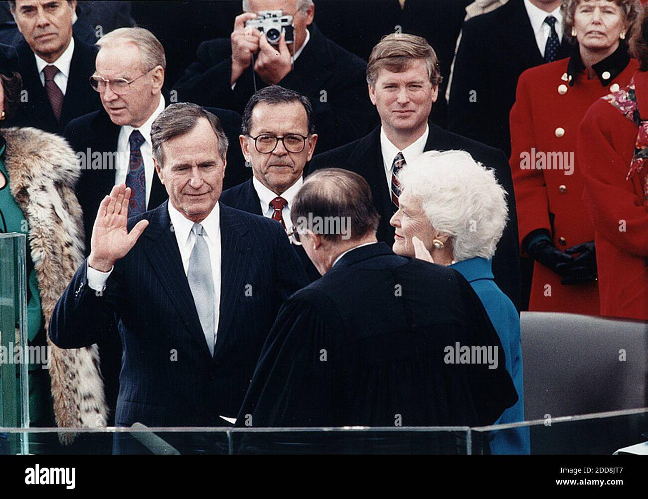 NO FILM, NO VIDEO, NO TV, NO DOCUMENTARY - Chief Justice William Rehnquist administers the oath of office to US President George H.W. Bush on the west front of the U.S. Capitol, as Vice President Dan Quayle and Barbara Bush looking on, in Washington, D.C., USA on January 20, 1989. Photo by Architect of the Capitol/Library of Congress/MCT/ABACAPRESS.COM Stock Photo