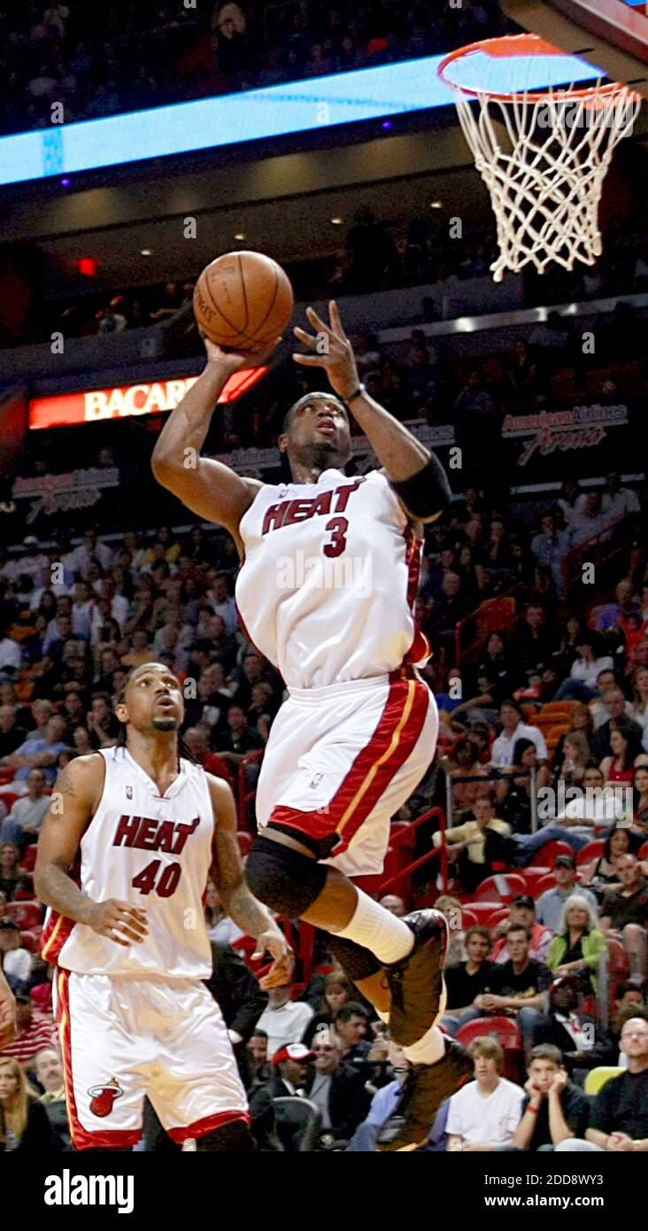 NO FILM, NO VIDEO, NO TV, NO DOCUMENTARY - Miami Heat's Dwyane Wade drives  to the basket during the first quarter at AmericanAirlines Arena in Miami,  FL, USA on March 2, 2015.