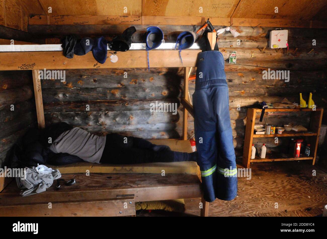 NO FILM, NO VIDEO, NO TV, NO DOCUMENTARY - Sebastian Schnuelle naps at the Tripod Flats Cabin, about 35 miles down the Iditarod Trail from Kaltag, Alaska, on the way to Unalakleet during the Iditarod on March 16, 2009,. Photo by Marc Lester/Anchorage Daily News/MCT/Cameleon/ABACAPRESS.COM Stock Photo