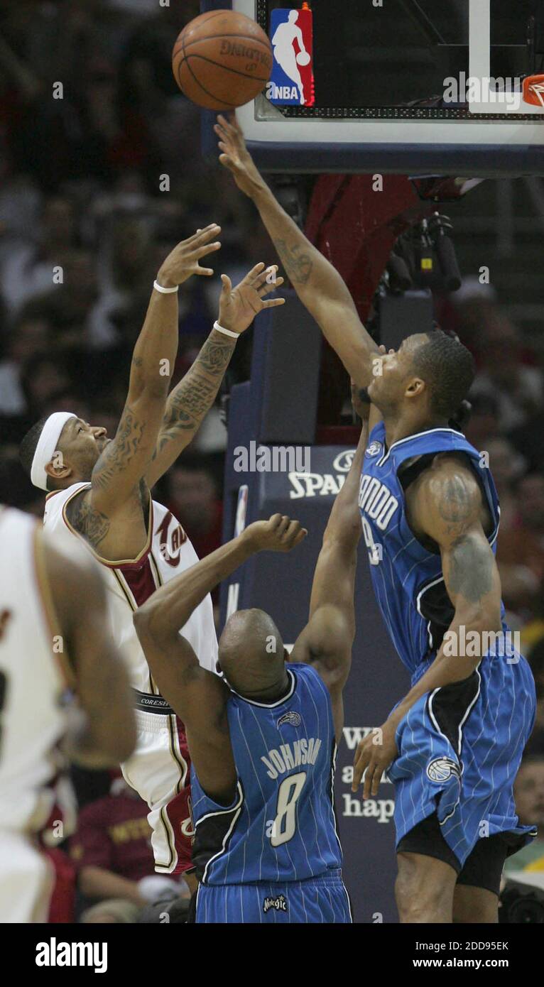 NO FILM, NO VIDEO, NO TV, NO DOCUMENTARY - Cleveland Cavaliers' guard Mo Williams (left) puts a shot up over Orlando Magic defenders Rashard Lewis (right) and Anthony Johnson (center) during first half action in Game 5 of the NBA Eastern Conference finals at Quicken Loans Arena in Cleveland, OH, USA on May 28, 2009. Photo by Ed Suba Jr./Akron Beacon Journal/MCT/Cameleon/ABACAPRESS.COM Stock Photo