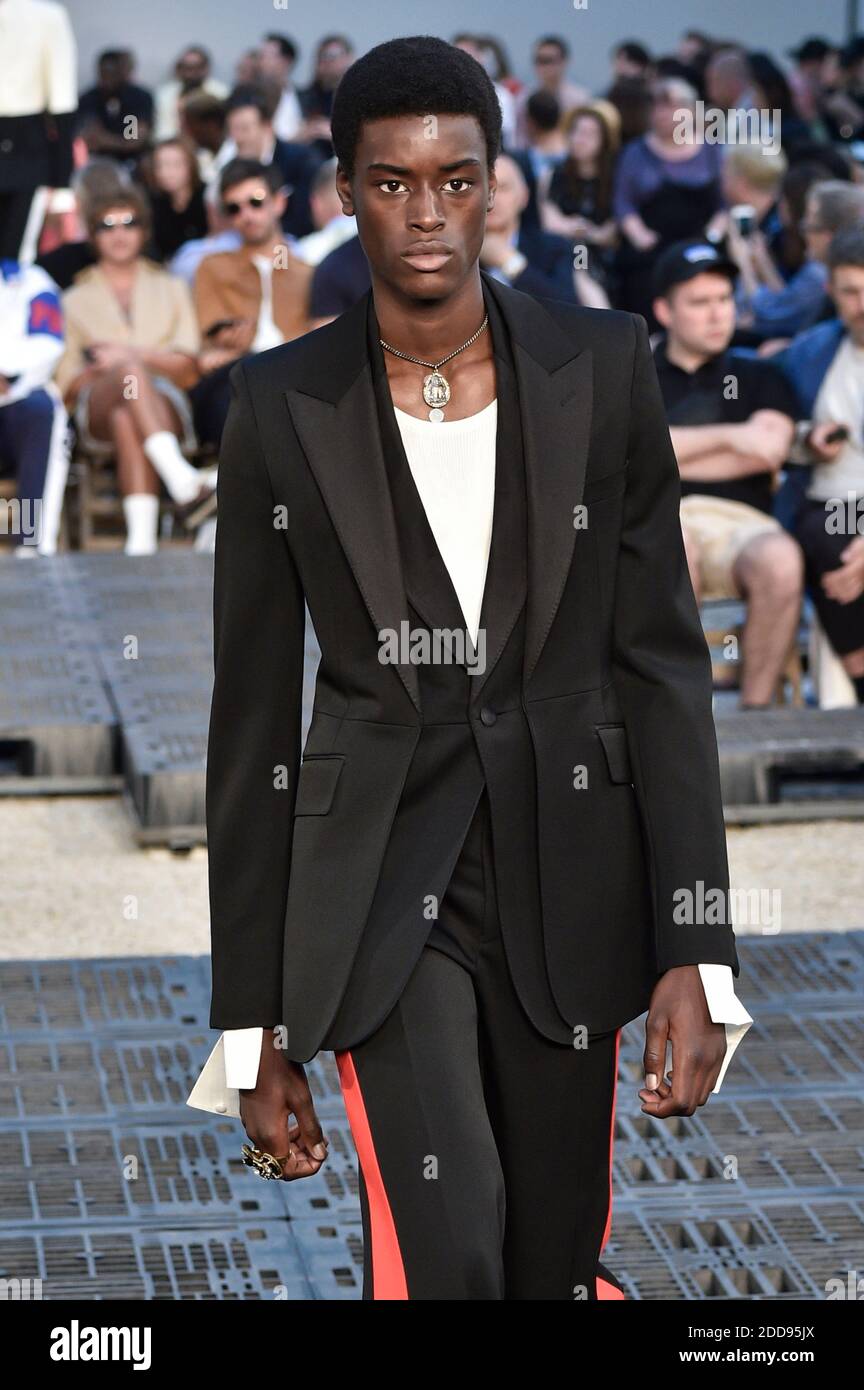 A model walks the runway during the Alexander McQueen Menswear Spring Summer 2019 fashion show as