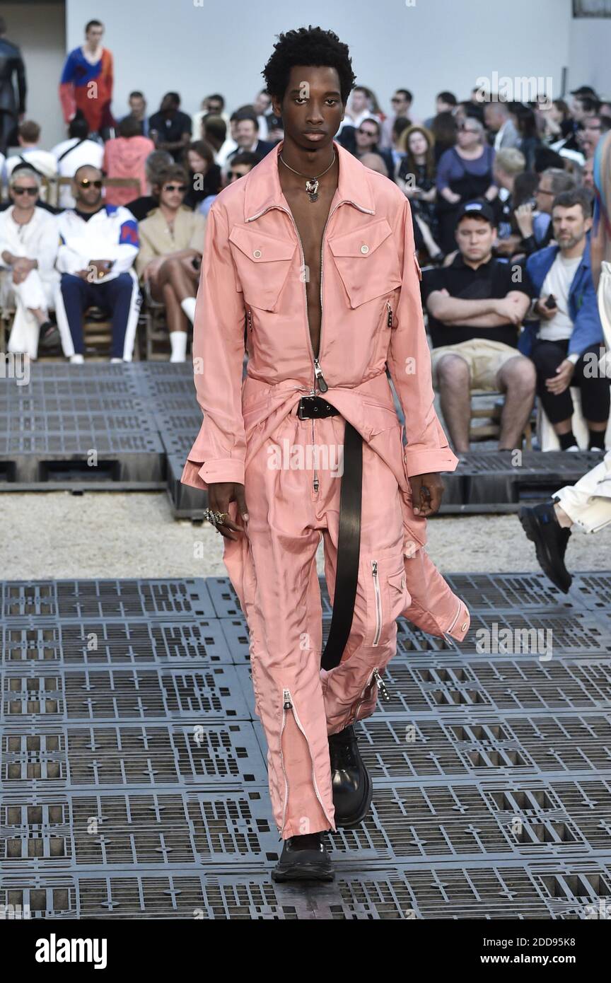 A model walks the runway during the Alexander McQueen Menswear