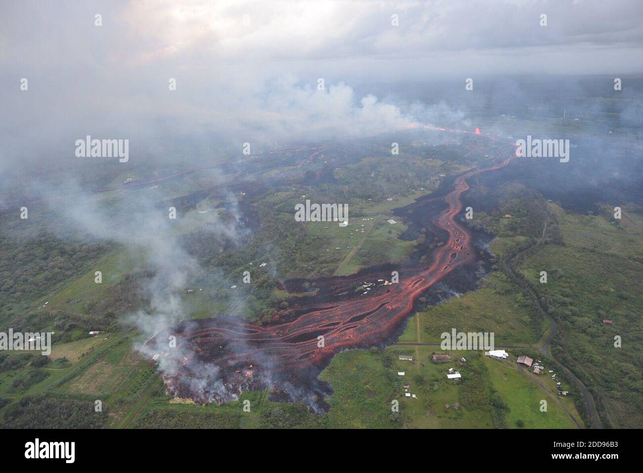 Handout photo taken on May 19, 2018 of KÄ«lauea Volcano — Channelized Lava Flow. Channelized lava emerges from the elongated fissure 16-20 (in the upper right). Photo taken May 19, 2018, at 8:18 AM HST. Photo by usgs via ABACAPRESS.COM Stock Photo