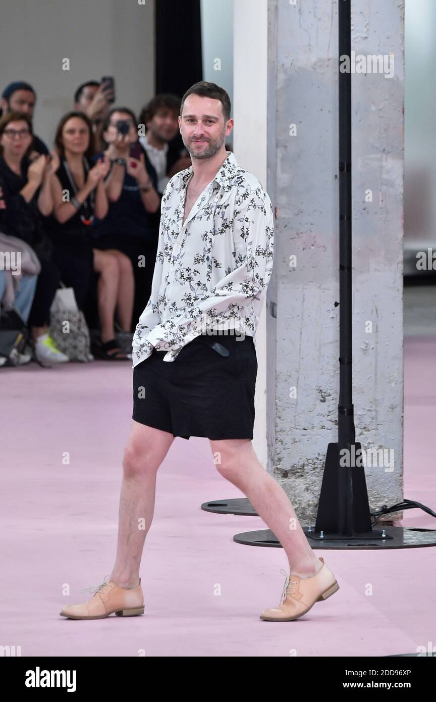 Fashion designer Sebastien Meunier walks the runway during the Ann